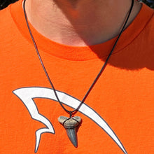 Load image into Gallery viewer, Beautiful Mako Shark tooth necklace while wearing one of our Megalodon shirts!