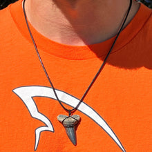Load image into Gallery viewer, Beautiful Mako Shark tooth necklace while wearing one of our Megalodon shirts!
